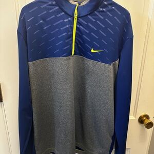 Nike Golf Men's Dri Fit  Performance 1/4 zip pullover.